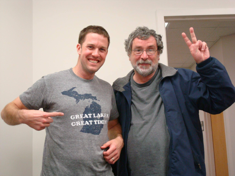 Mike Erwin posing with Dr. Chris Peterson
