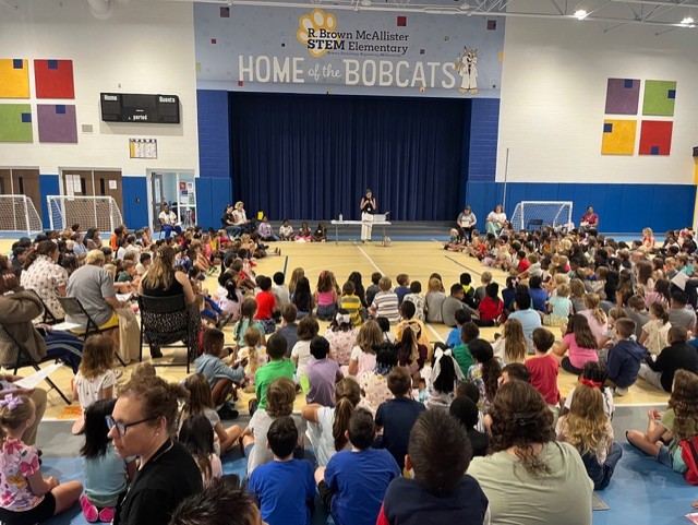 students at R. Brown McAllister student assembly