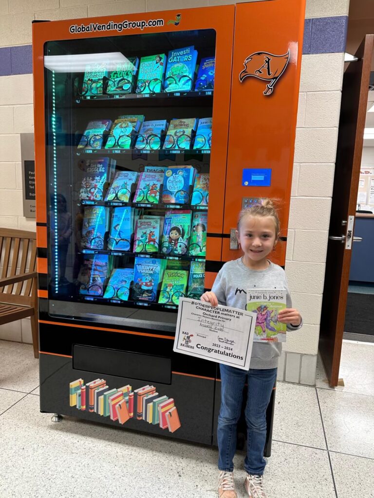 student-use-trait-a-month-for-book-vending-machine