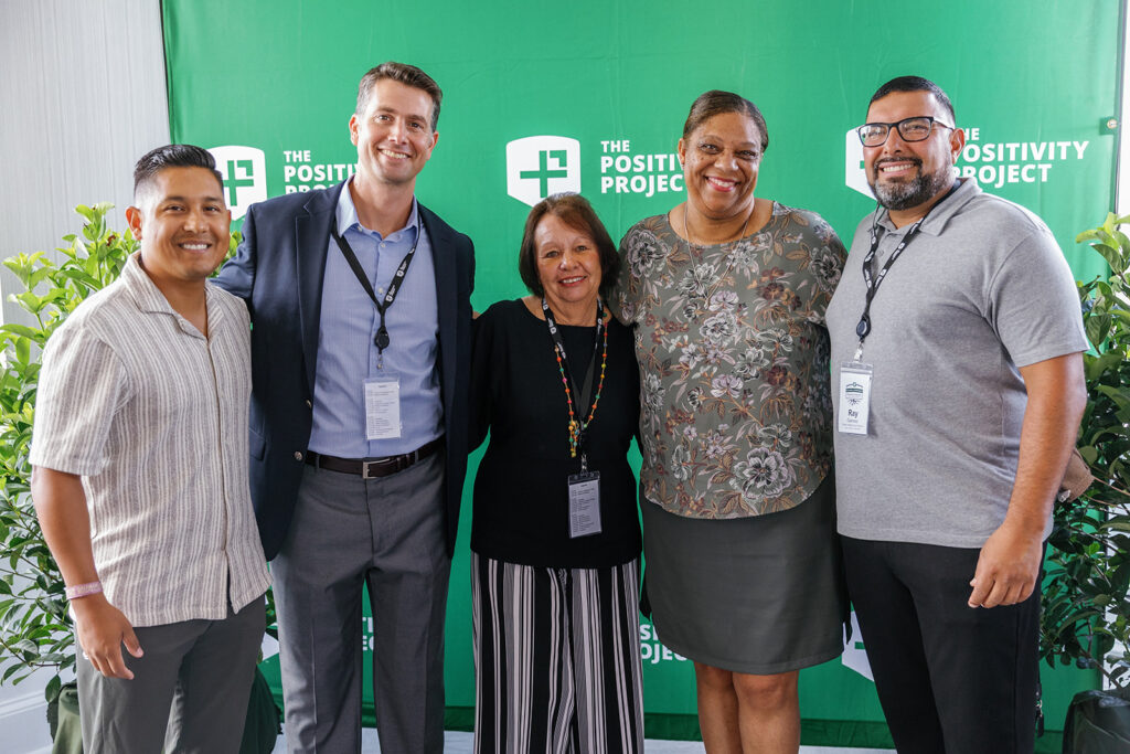 A group of 5 educators posing