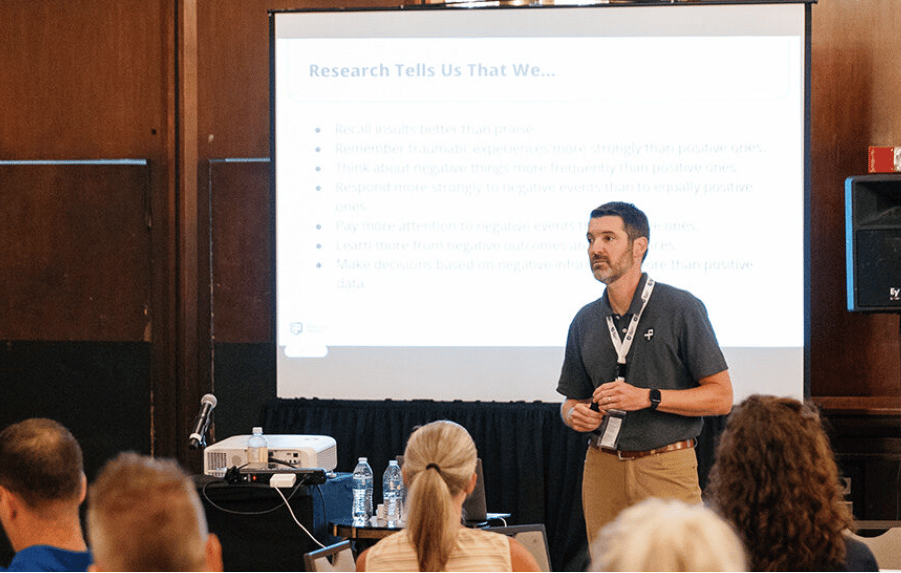 A man giving a P2 presentation