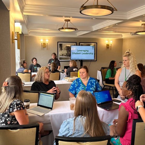 A crowd of people attending a Leveraging Student Leadership course