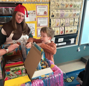 student choosing ice cream from a mobile cart as a reward