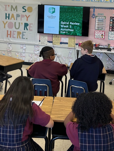 students-at-desk-during-class-lesson