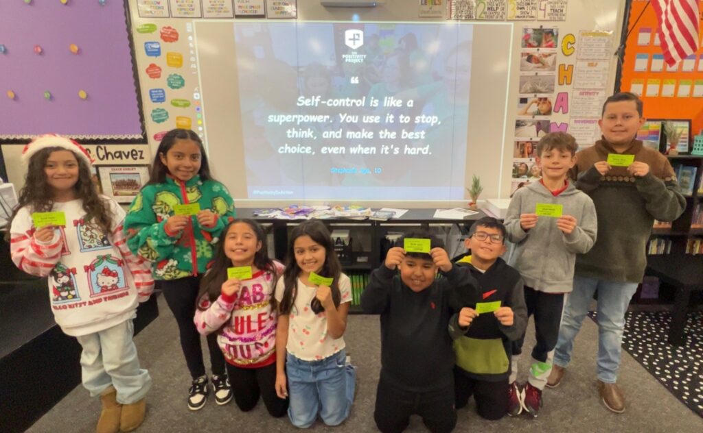 elementary-school-students-showing-off-hard-work