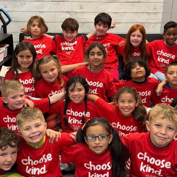 kids-posing-together-wearing-red-shirts