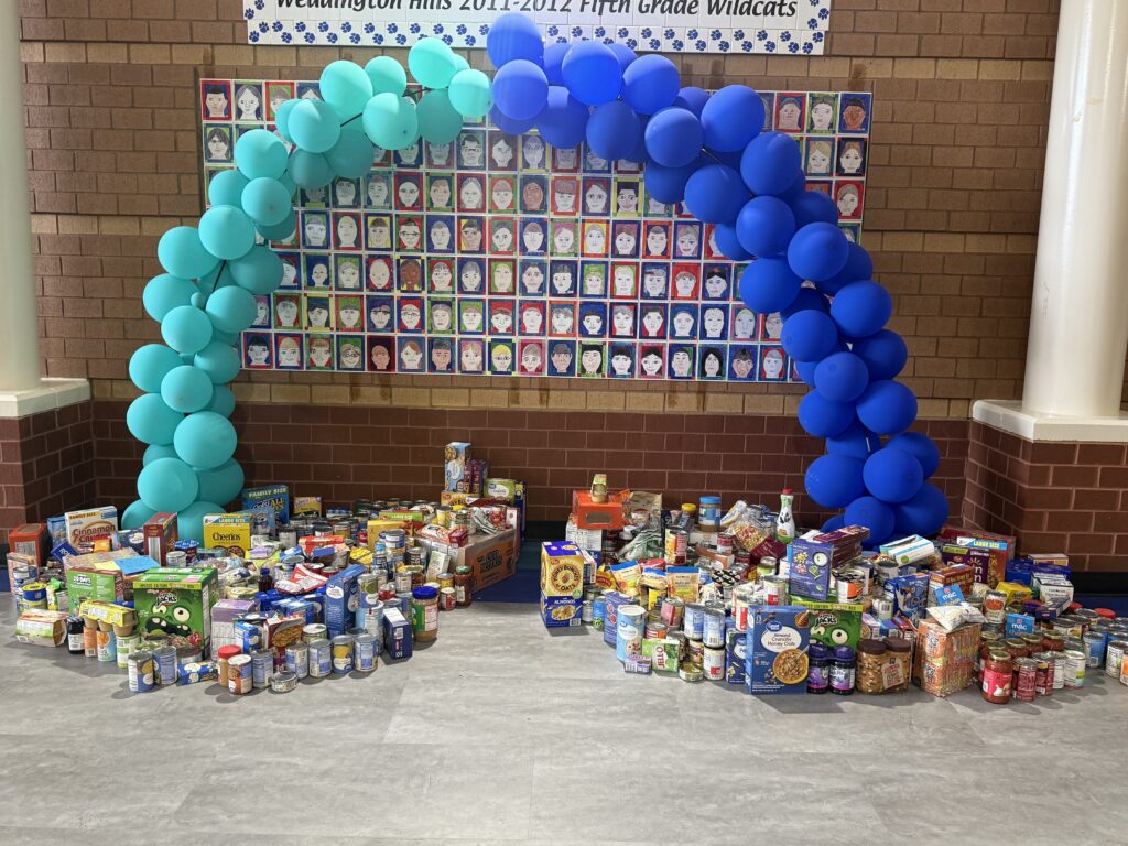 canned-foods-under-balloon-arch