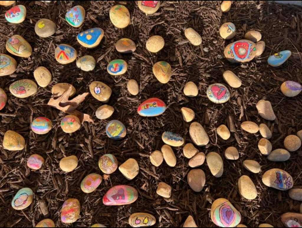 painted-rocks-lying-in-dirt
