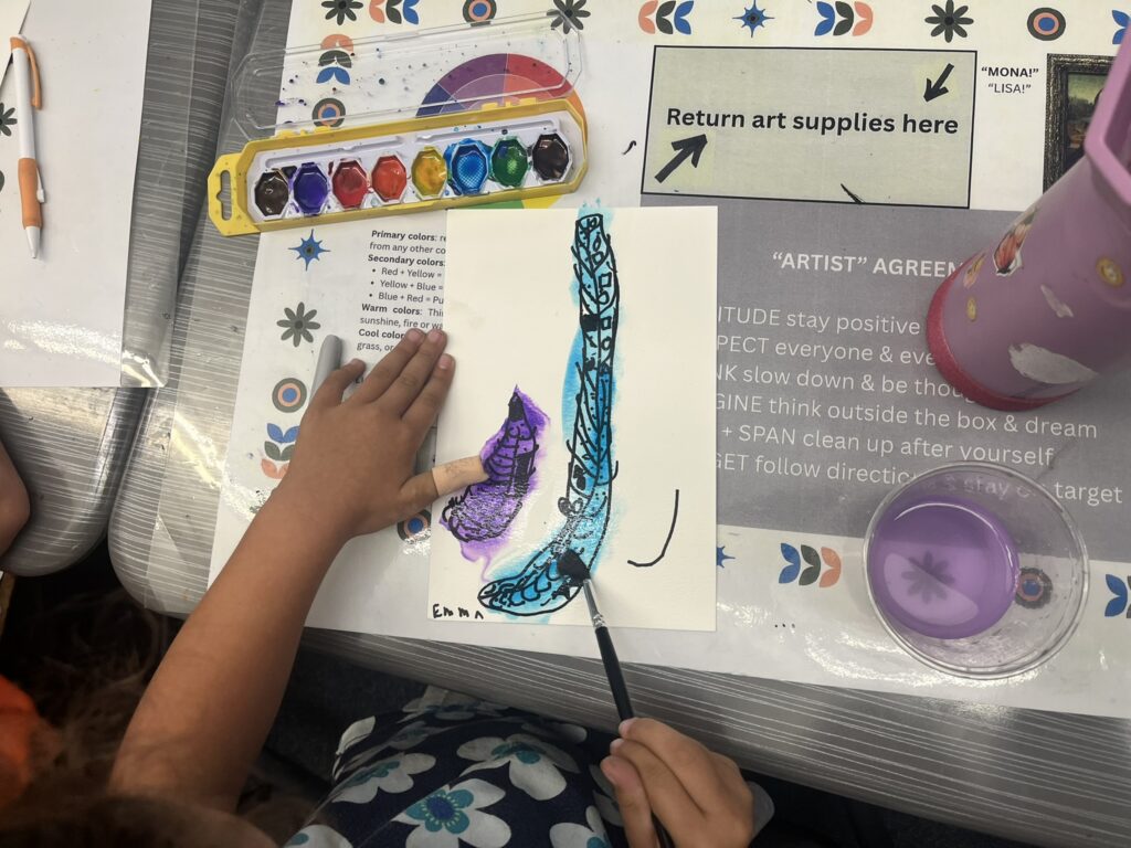 student-painting-with-watercolors