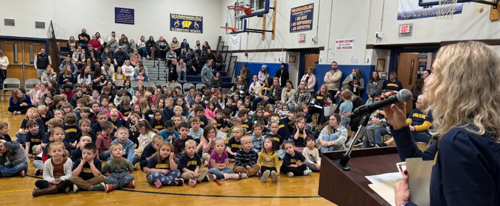 large-group-of-young-students-in-school-assembly-in-school-gym
